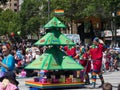 Fantasy floats ` The Kindness Tree ` perform in the 2018 Credit Union Christmas Pageant parade.